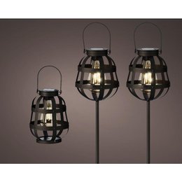 Set of 3 LED solar-powered lanterns for outdoor lighting. Spherical metal cages with warm white LED lights. Ideal for gardens, patios, or pathways.