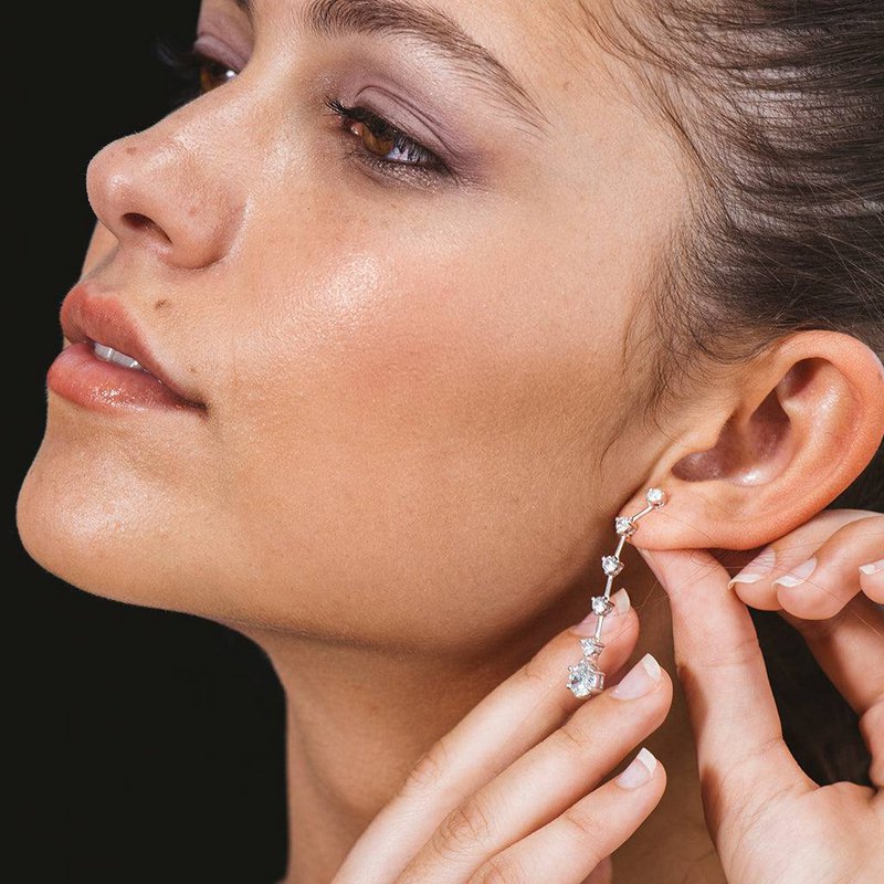 Long silver earrings with white zirconia