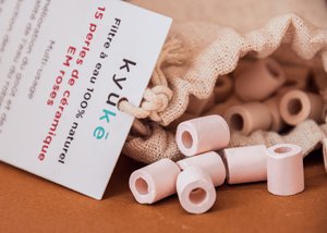Zakje met 15 EM® roze keramische kralen