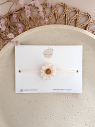 Hairband with natural wool flower, perfect accessory for kids.