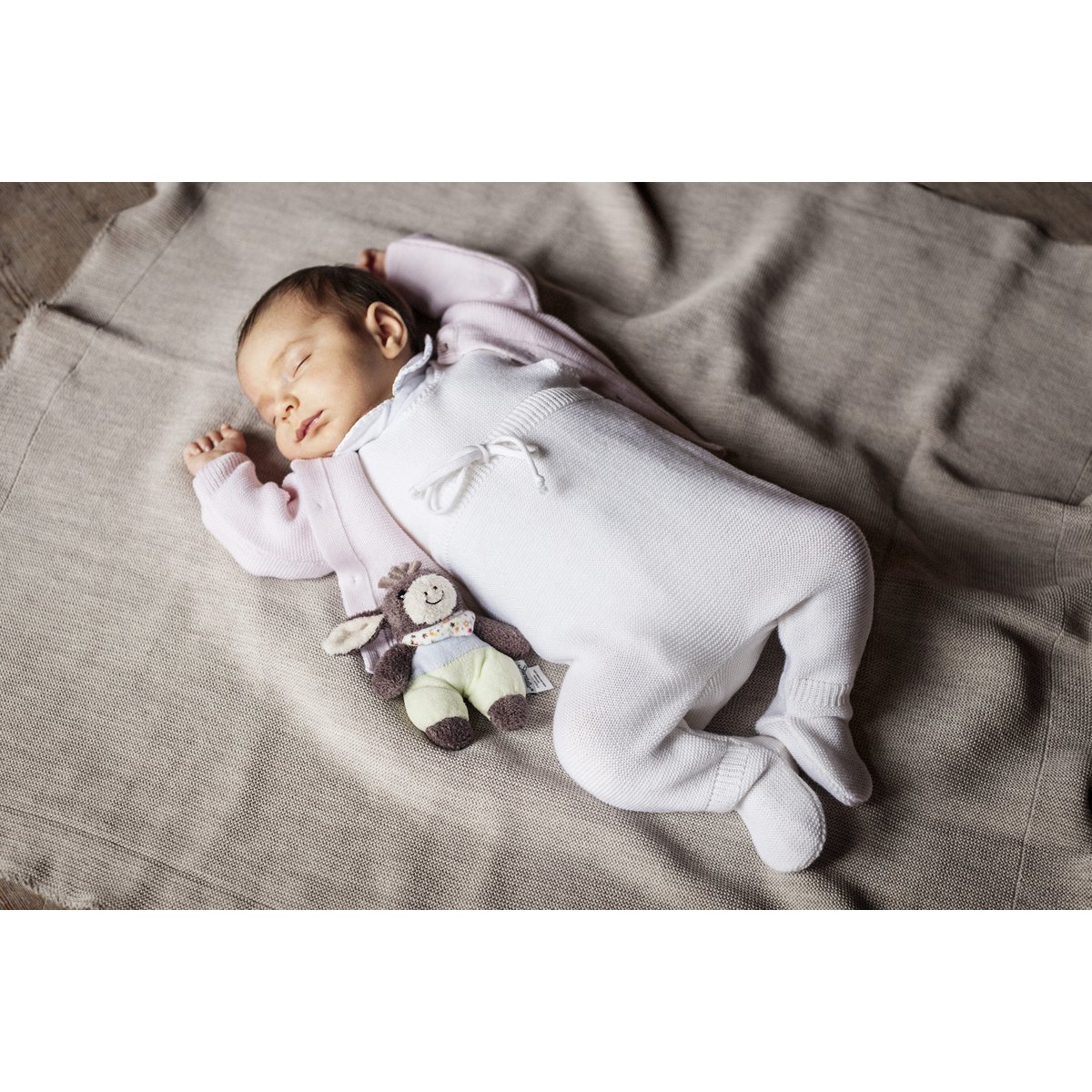Rompers med fødder off-white lavet af 100% fineste merinould
