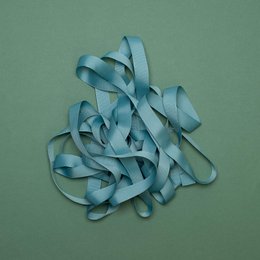 Mint green satin ribbon with "My Pretty Circus" text. Soft, smooth texture. Suitable for gift wrapping, crafting, and decorative purposes.