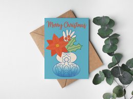 Delft blue floral holiday greeting card with poinsettia flower and Christmas message.