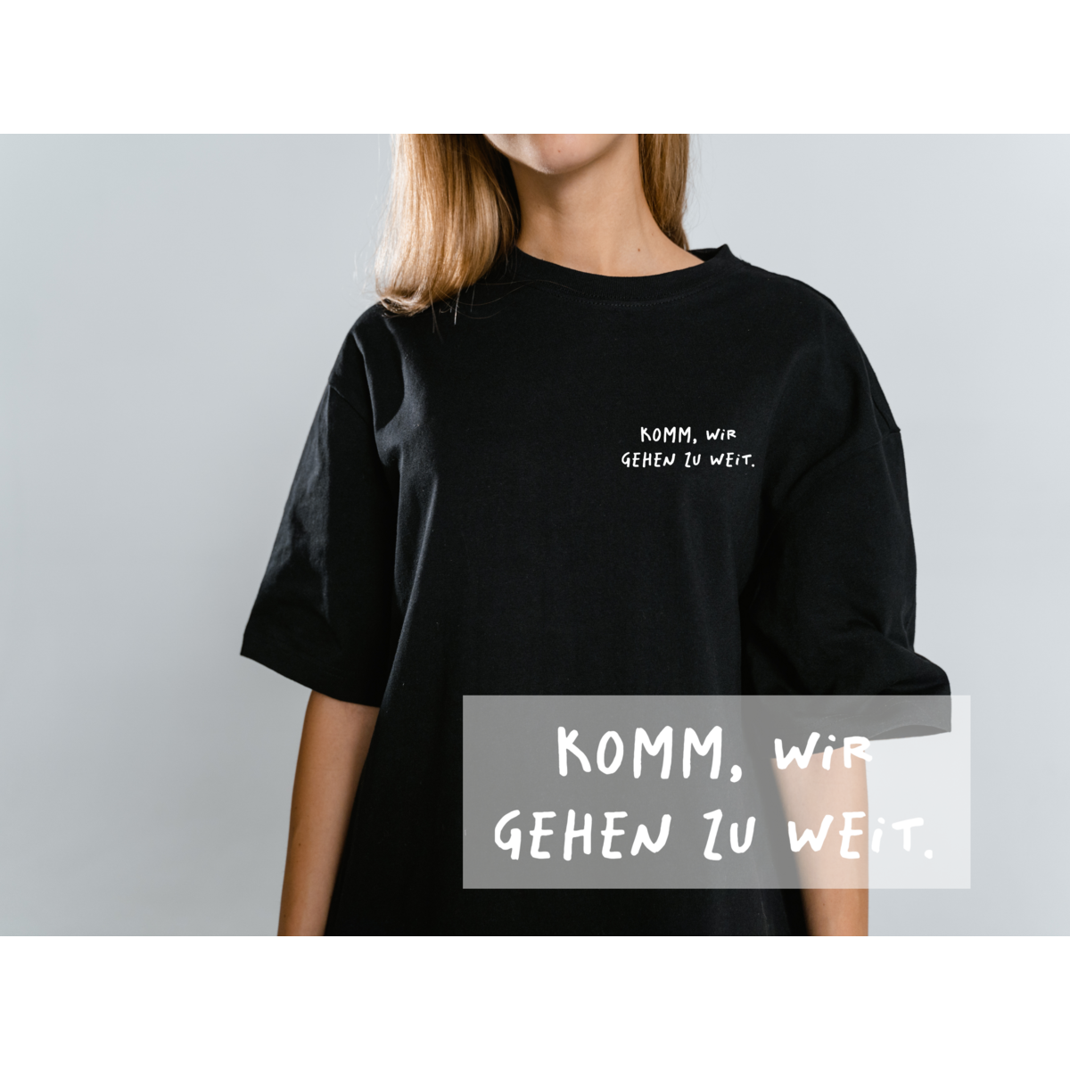Opstrijkapplicatie "Kom op, we gaan te ver." – DTF-overdracht, zwart/wit