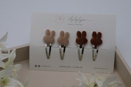 Hair clips in gold and silver colors, featuring a klikklak design.