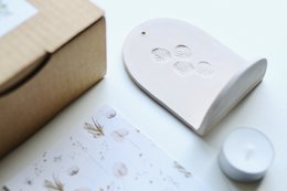 Ceramiczny wieszak ścienny ze świecą