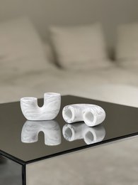 White marble U-shaped candlestick holder, available in white, brown, and gray marble finishes.