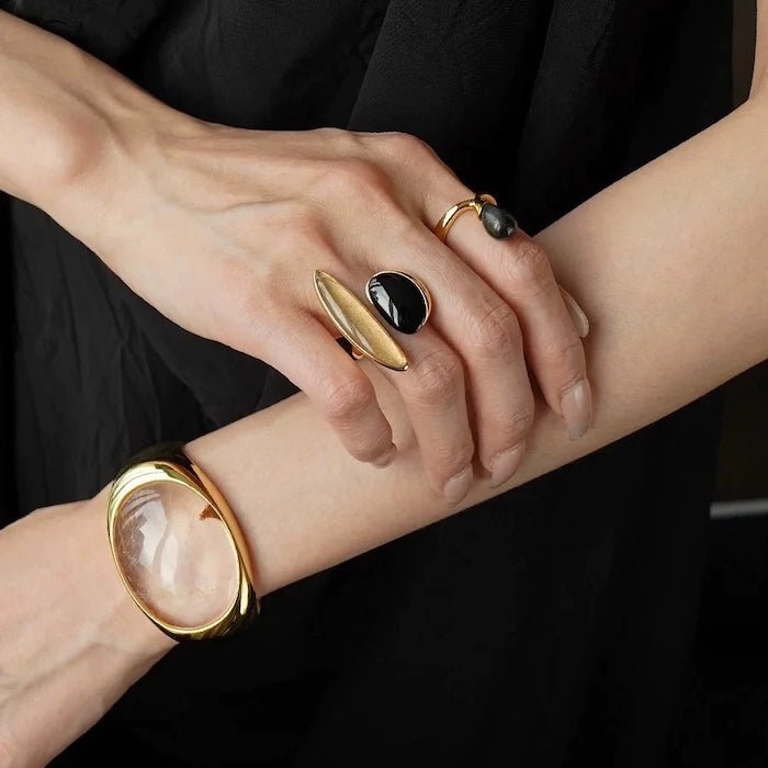 Fed minimalistisk guldrutileret kvarts bred bangle