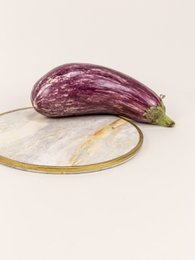 Natural stone round tablemat with brass edges