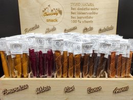 A set of 10 flavors of nuts, each with 20 pieces weighing 10g. The nuts are displayed in clear plastic bags, showcasing their variety of colors and shapes. The packaging includes the brand name and product details.