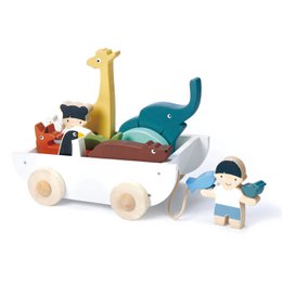 Wooden animal figurines on a wheeled wagon, featuring a giraffe, elephant, and other animals. The wagon has a whimsical, playful design suitable for young children.