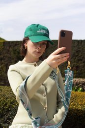 Laccetto reversibile per telefono "Il portagioie verde"