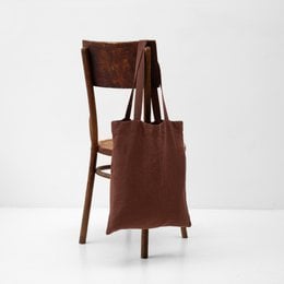 Sage linen tote bag, a simple and versatile shopping bag made of natural linen fabric.