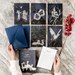 Set of 6 A5 greeting cards with nature-inspired silhouette designs in black and white. Includes images of deer, flowers, and birds against a dark background.