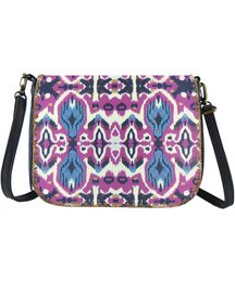 Vibrant ikat-patterned shoulder bag with adjustable strap and zipper closure.
