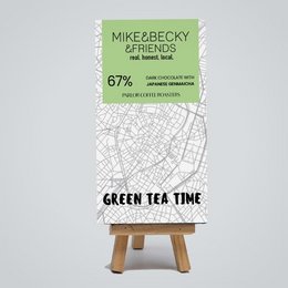 Dark chocolate bar with green tea flavor and parlor design. Made by Mike & Becky Friends.
