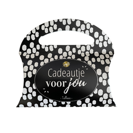 A black and white polka dot gift bag with the text "Cadeautje voor jou" (Gift for you) printed on it.