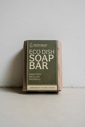 Eco dish soap bar, natural, plant-based ingredients, sustainable packaging.