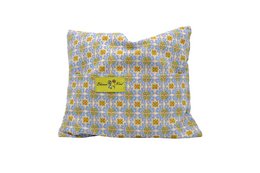 Floral patterned pillow in small, medium, and large sizes. Features a repeating daisy-like flower design in shades of yellow, gray, and white.