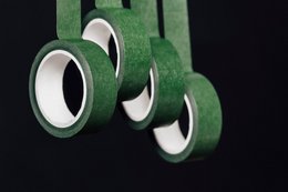 Green washi tape rolls with a matte finish and a vibrant green color.