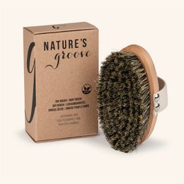 Natural dry brush made of wood and natural bristles, suitable for skin care and exfoliation.
