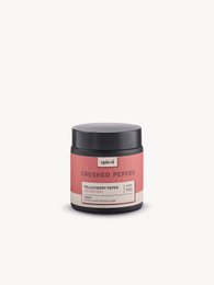 Crushed pepper spice jar, red label, glass container, black lid, kitchen seasoning storage