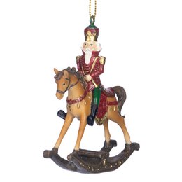  A decorative nutcracker figure on a rocking horse, featuring a red and green uniform and a brown horse.
