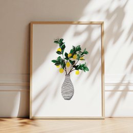 Vibrant lemon tree in a striped vase, featuring green leaves and yellow lemons. Suitable for home decor or as a poster.