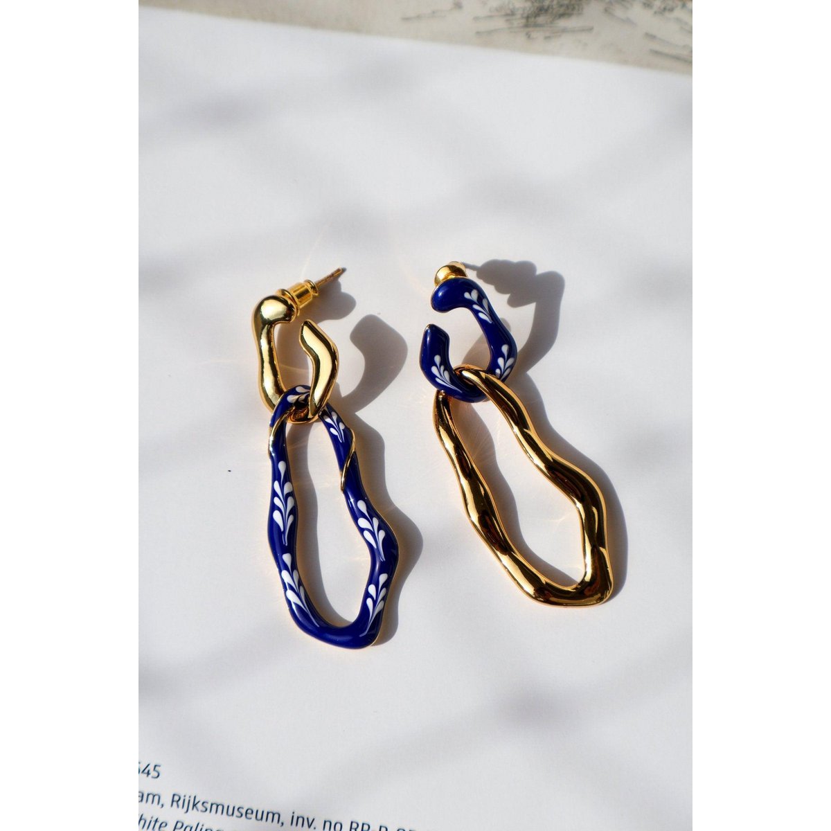 Boucles d'oreilles 2 en 1 en émail Varia — Bleu et doré