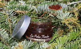 Balsamic fir cream with a rich, dark brown color and a smooth, creamy texture. Contains natural ingredients like fir essential oil for a fresh, earthy aroma.