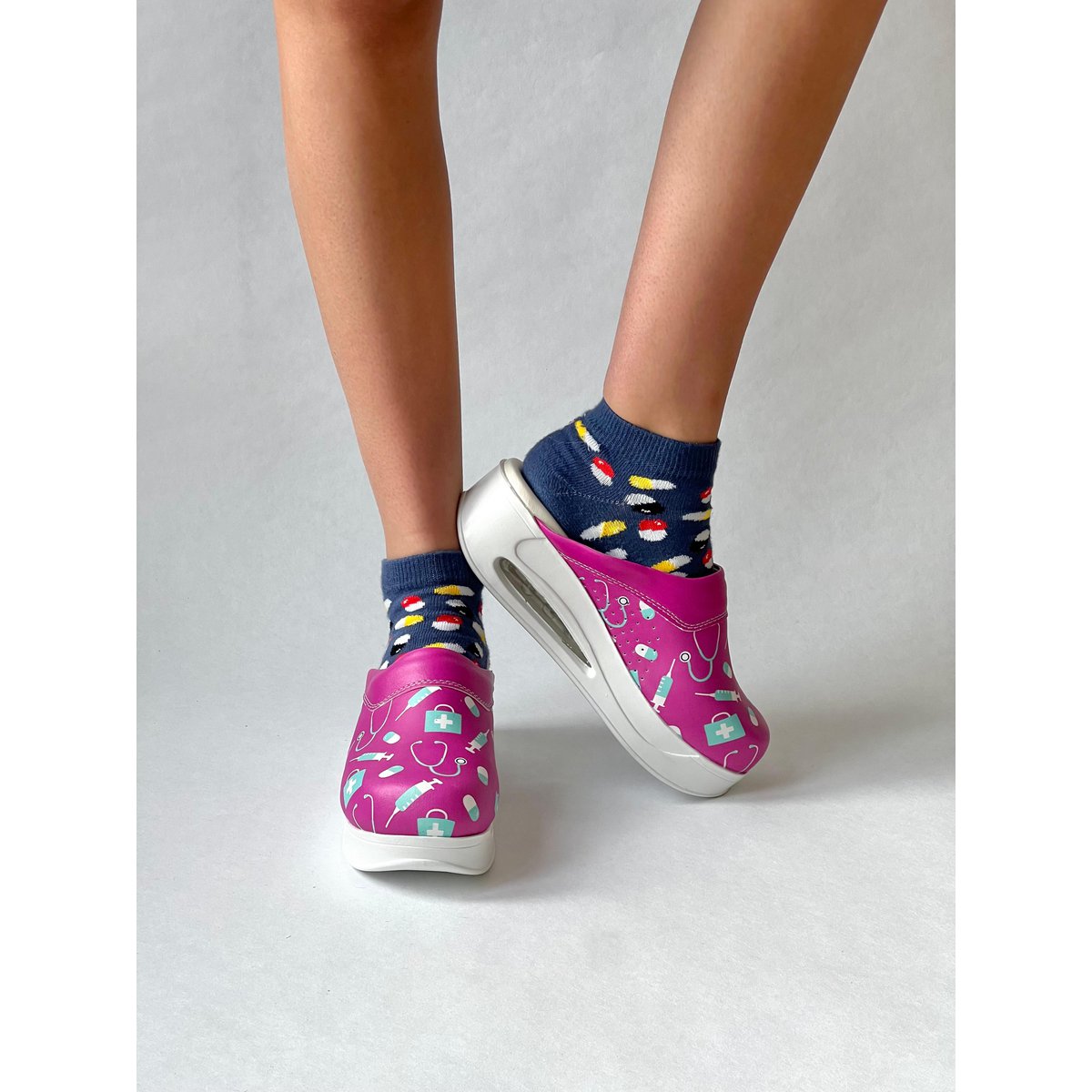 Care fuchsia airmeds clogs