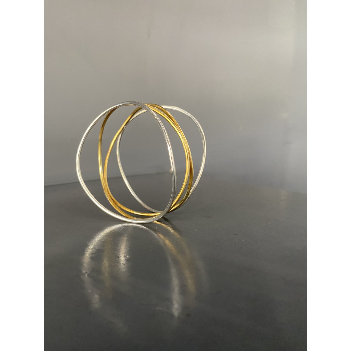 Double Wave Bracelet in silver and brass