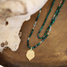  Tree of life pendant necklace with euchlorite beads and gold-tone leaf charm. Layered necklace with green and gold tones, featuring a natural stone pendant.