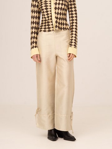 Cremefarbene Glitzerhose „Clown“.