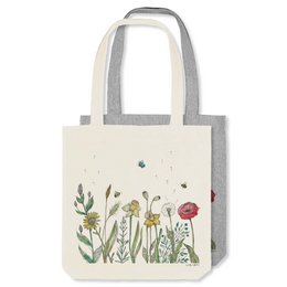 A natural-colored jute bag featuring a colorful floral meadow design, suitable for shopping or everyday use.