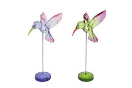 Decorative steel hummingbird sculpture, available in two color options - pink and green. Features intricate details and a glass base for display.
