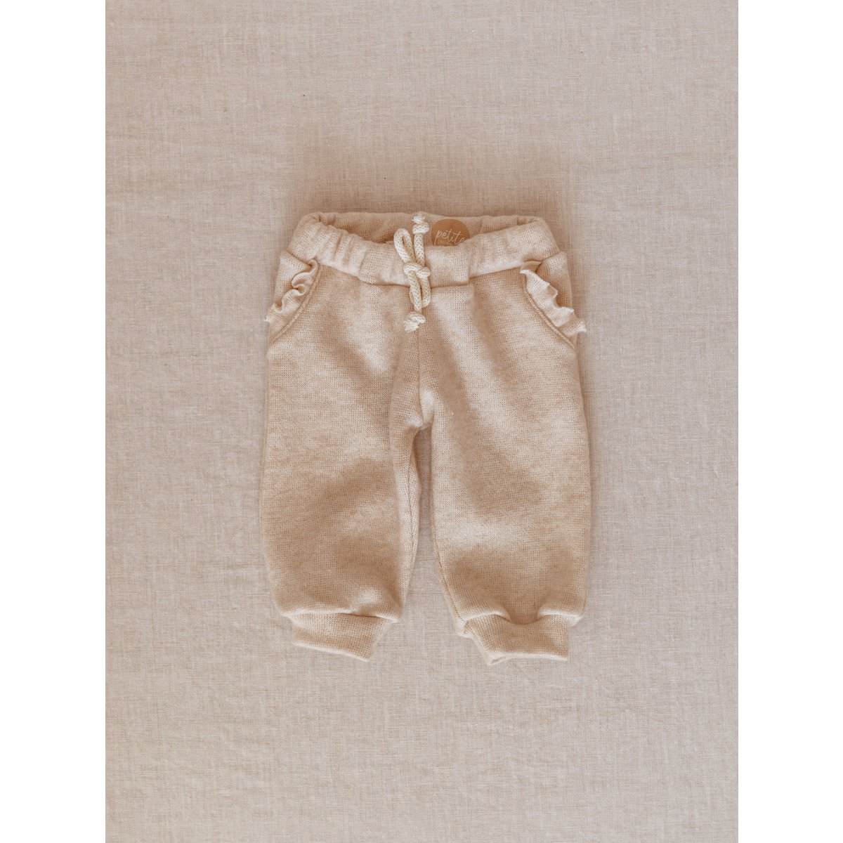 Pantaloni sportivi / volant da ragazza - Crema