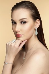 Silver drop earrings with milky aqua stones, elegant and feminine design.