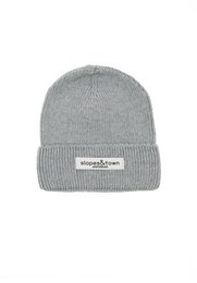 A grey melange knit beanie made of soft merino wool, suitable for children aged 1-5 years and 6 years and older. The beanie features a small branded label.