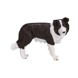 A black and white border collie dog toy with a fluffy, realistic appearance.