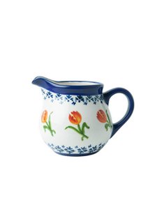 Milk can orange tulip