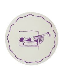 Blue and white ceramic dessert plate with an illustration of a beach chair and umbrella. The plate has a textured border and the design is in a simple, hand-drawn style.