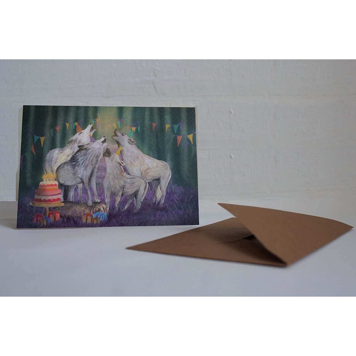 Tarjeta de felicitación cantando lobos