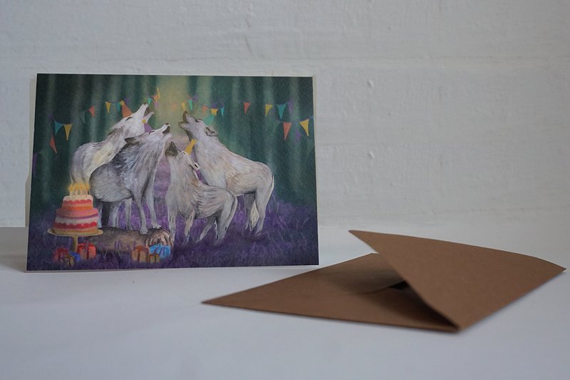 Tarjeta de felicitación cantando lobos