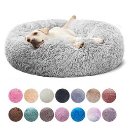 Soft, plush pet bed in a variety of colors and sizes to provide a comfortable resting place for your furry friend. The round, donut-shaped design offers a cozy, nest-like feel.
