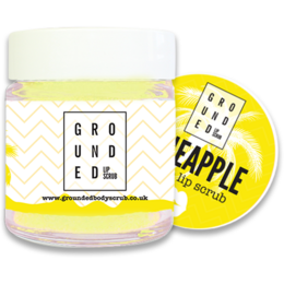 Pineapple-scented lip scrub in a 30ml jar, exfoliates and moisturizes lips.