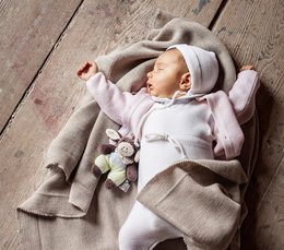 Chaqueta cuello redondo rosa hecha de 100% lana merino más fina