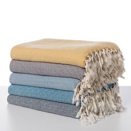 Soft, cozy plaid throw blanket in a variety of colors including black, yellow, green, taupe, grey, blue, raspberry, turquoise, melon, fuchsia, and pink. Made of a durable, diamond-patterned material that is suitable for all seasons.