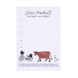  A notepad with a whimsical illustration of mushrooms and the text "Wer trödelt, hat mehr vom Leben" which translates to "Who dawdles, gets more out of life".