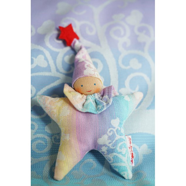 Clutching toy star Marie in Wonderland